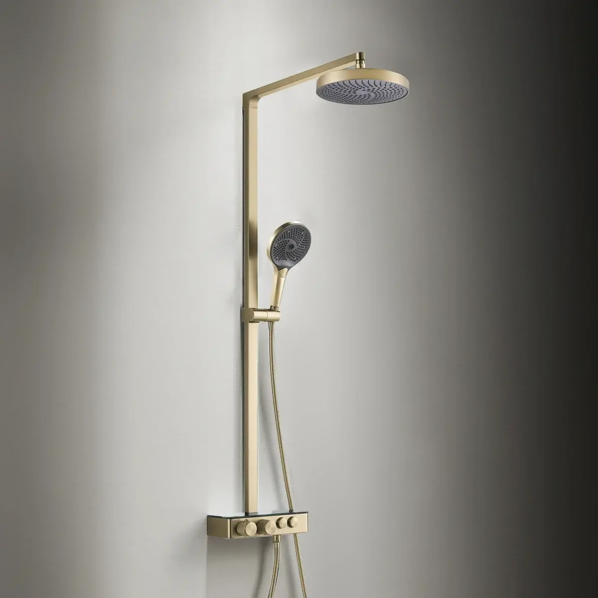Colonne de douche thermostatique Bruma Champagne avec douche de tête et douchette.