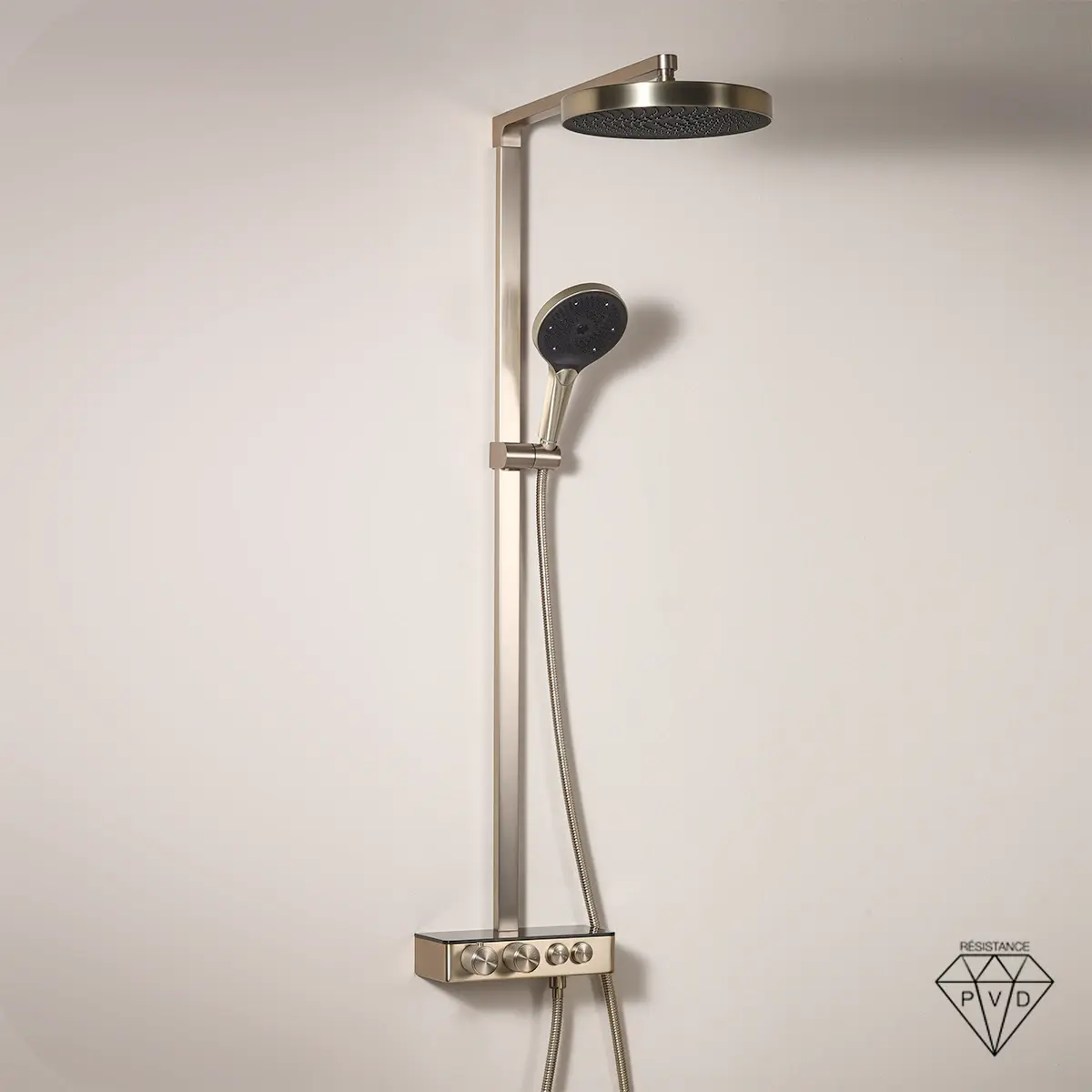 Colonne de douche thermostatique Bruma Champagne avec douche de tête et douchette.