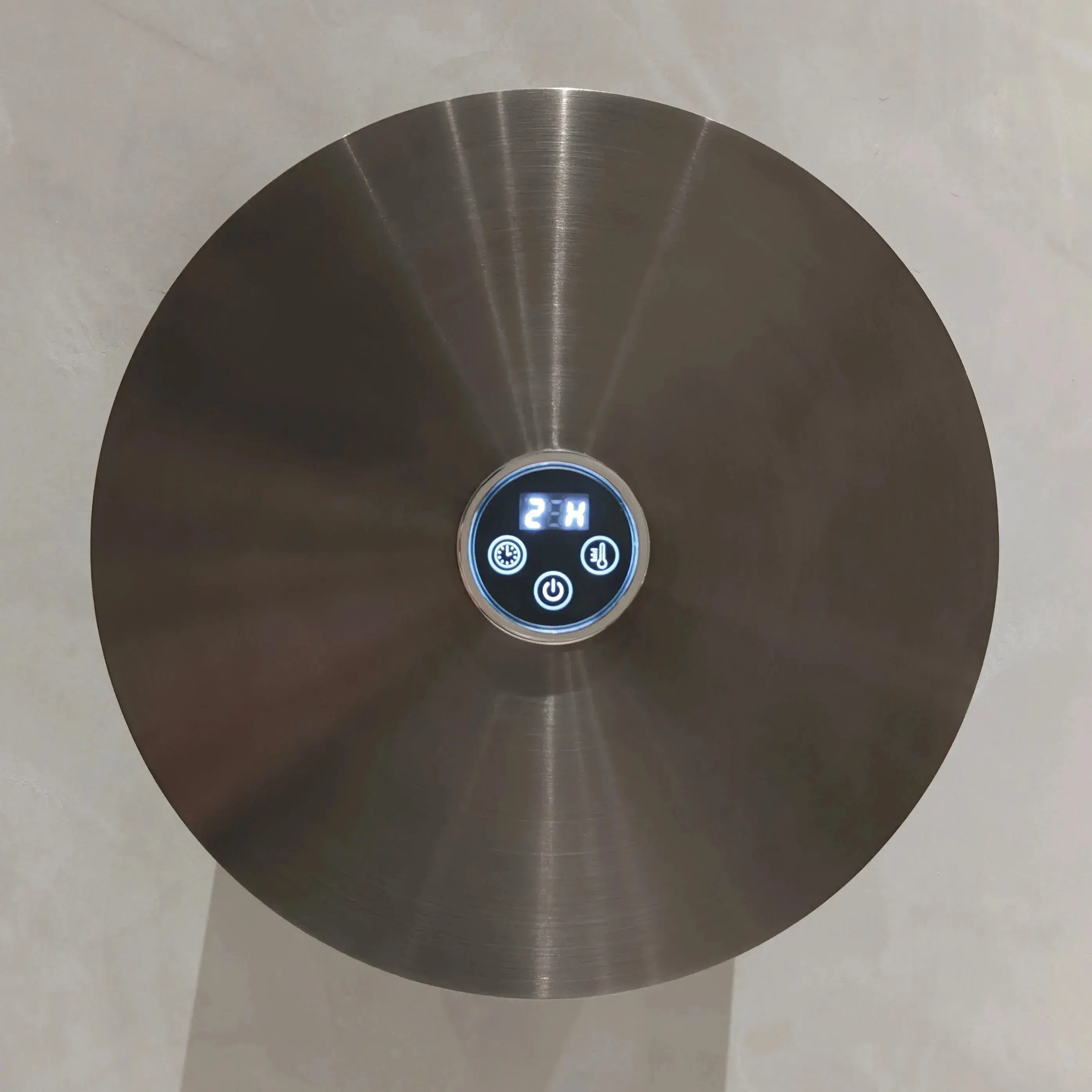 Sèche-serviettes électrique mural de forme ronde diamètre 21cm, finition métal brossé sombre (Gun Métal).