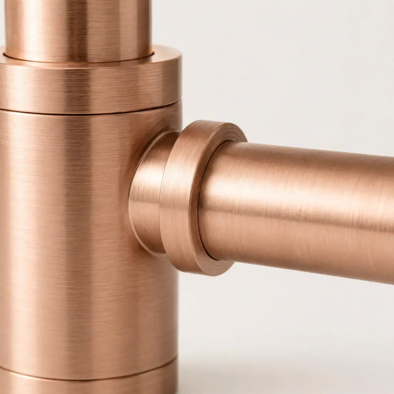 Siphon en inox, finition doré rose brossé   