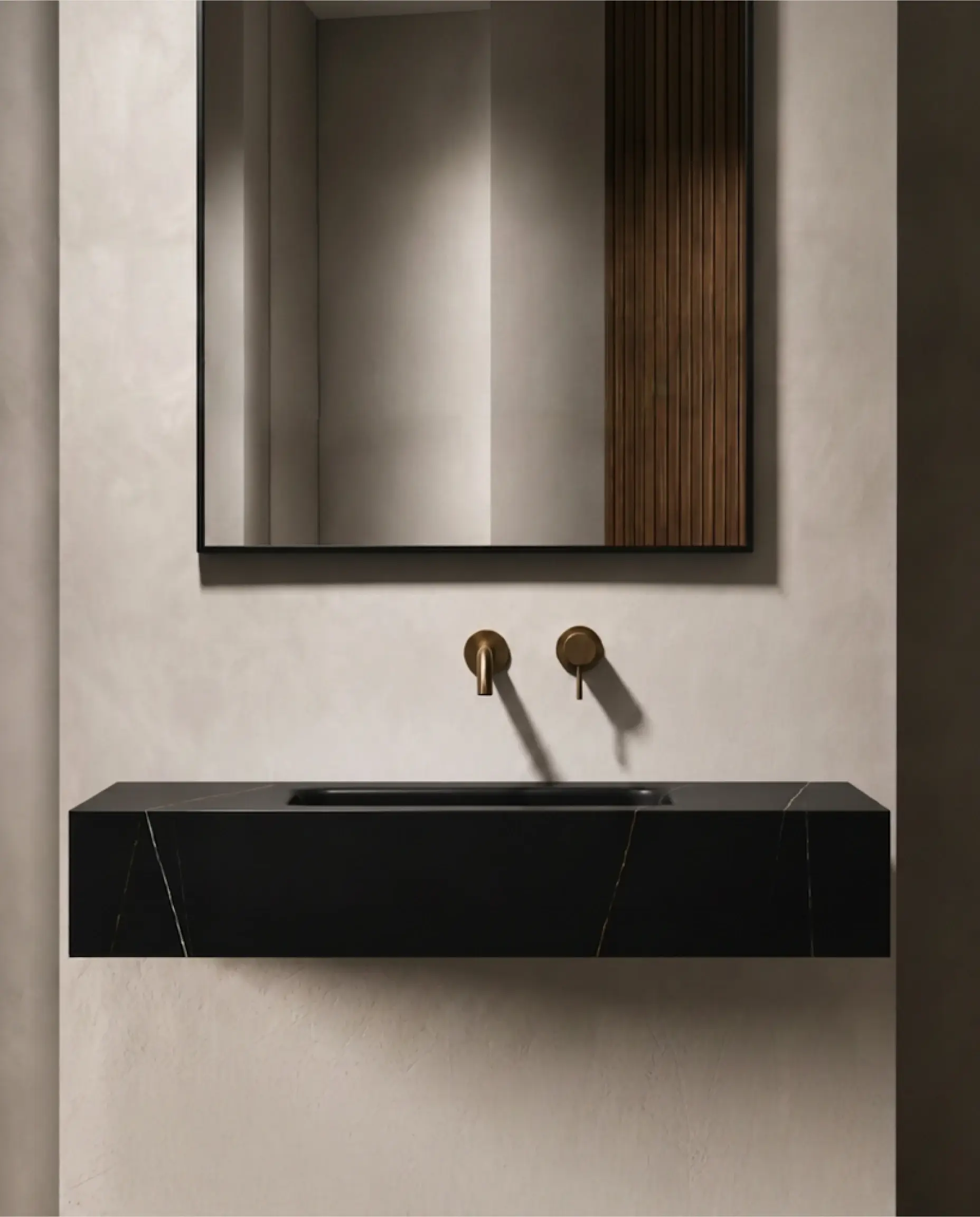 Plan vasque suspendu en céramique effet marbre noir mat aux veinages ocre Eden avec son meuble sous-vasque suspendu en bois Irene en 100cm .
