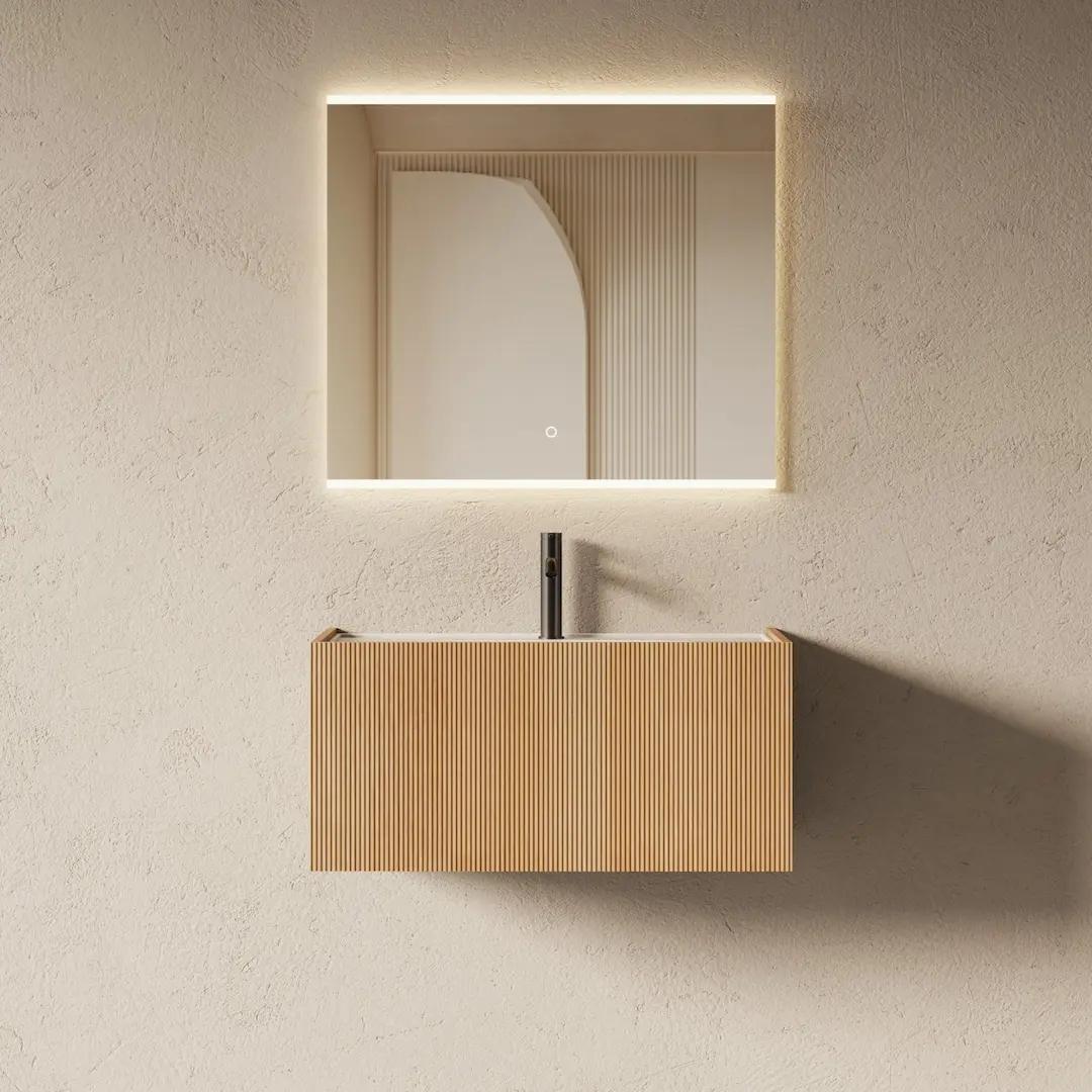 Meuble de salle de bain suspendu à 1 tiroir en bois finition chêne naturel cannelé vertical avec vasque simple intégrée.